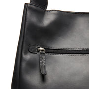 Fioline Full-Grain Leather Handbag für Damen - Seitenansicht mit ergonomischem Ärmelschnitt