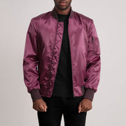 Quinton MA-1 Kastanienbraun Leder-Bomberjacke für Herren - Seitenansicht mit ergonomischem Ärmelschnitt